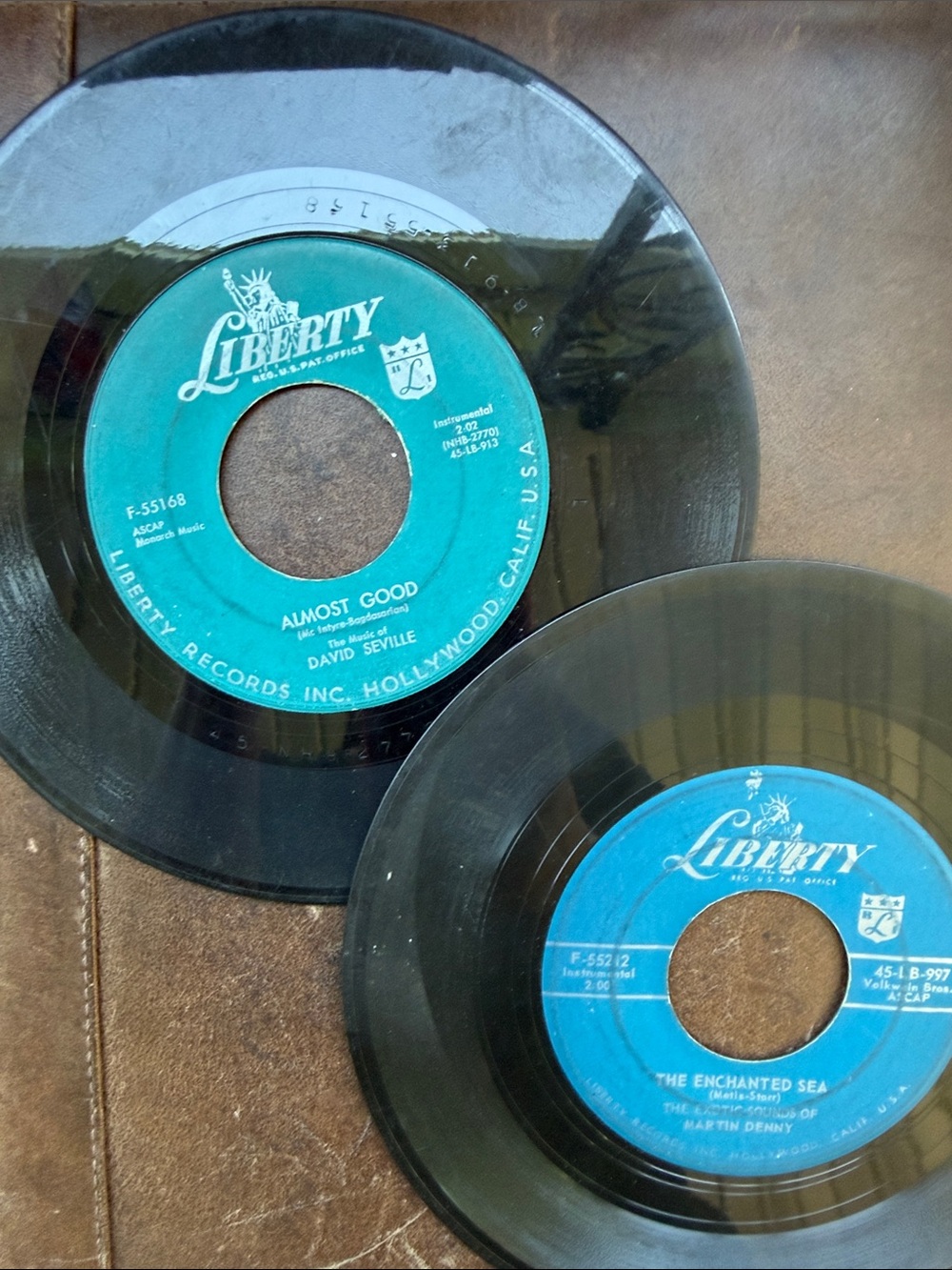 2- Liberty 45 RPM Singles with Teal/Blue Labels